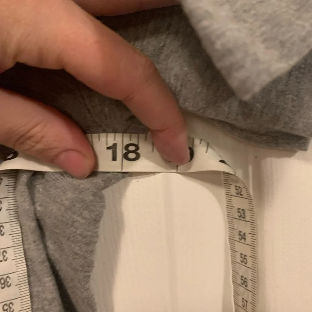 Nike grey and white tee with Nike‎ symbol